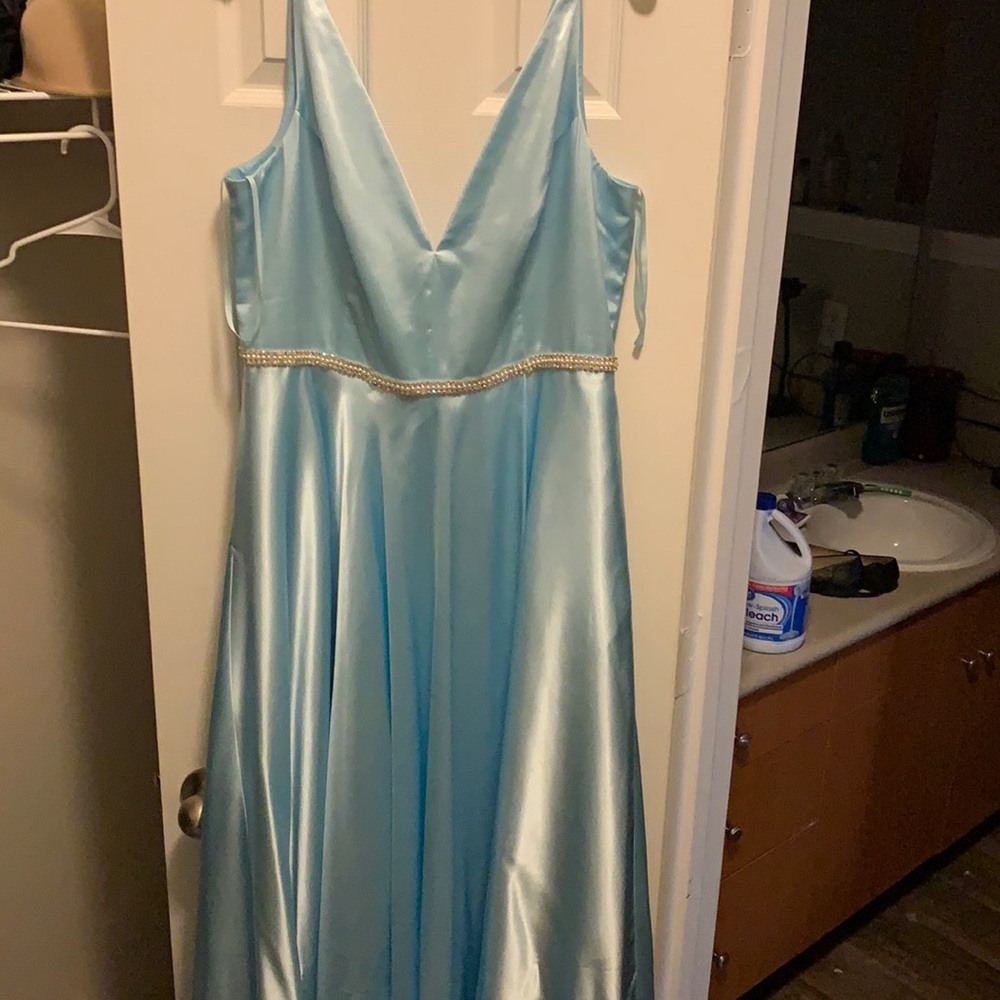 I am selling this blue silky blue dress